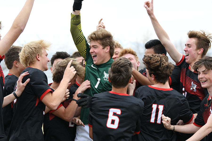 Soccer+boys+celebrate+the+season+March+13th%2C+their+last+time+together+as+a+team.