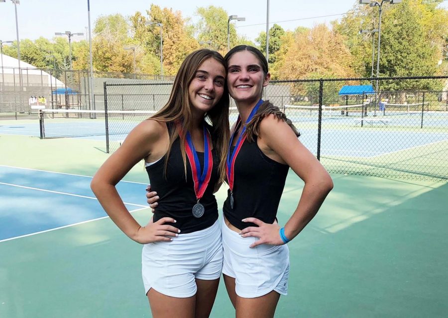 Raquel Passey and Brooklyn Dowdell pose for a post state tournament photo after their second place state finish.
