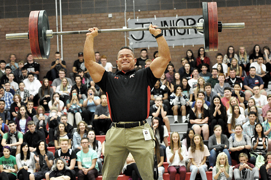 Dr. Brian McGill deadlifts 245 pounds to the cheers of students at the 2015 Hello Assembly.