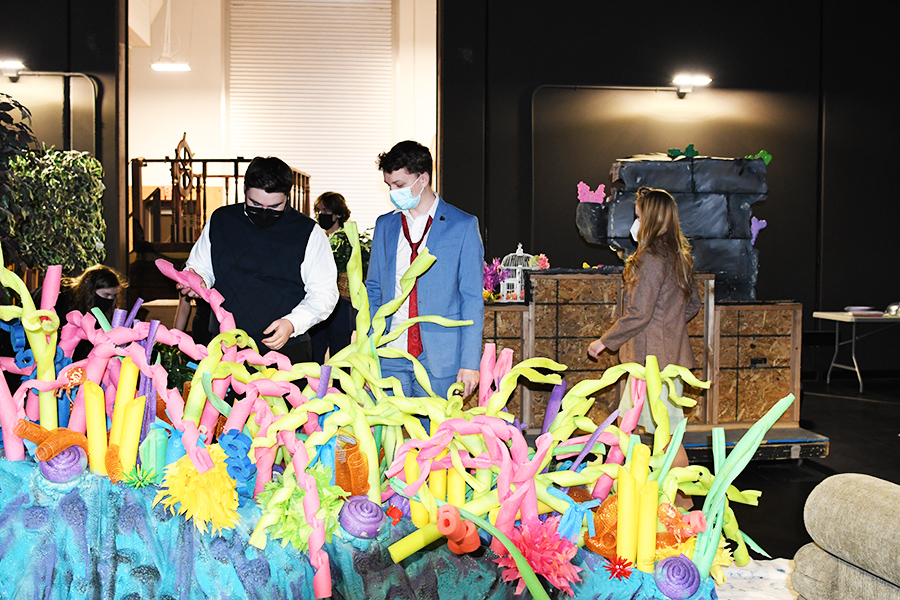 Students examne underwater scenery that will be used in this years on stage musical, The Little Mermaid. Tickets are $10 and can be ordered on line on the school website: ahs.canyonsdistrict.org.