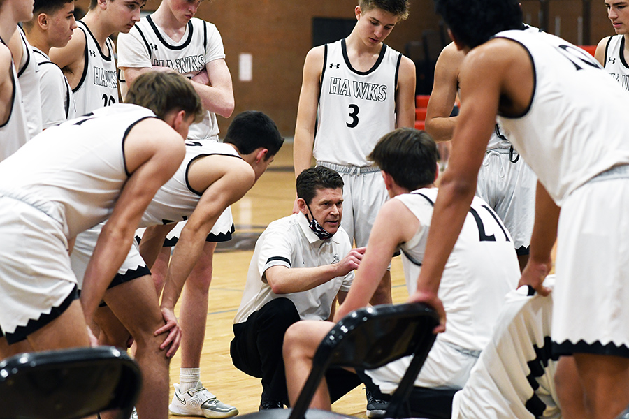 Coach Jim Barker speaks to the team during a timeout in the first game of the state tournament with Murray. The team takes on highly seeded Timpview in the quarterfinals on Wednesday.