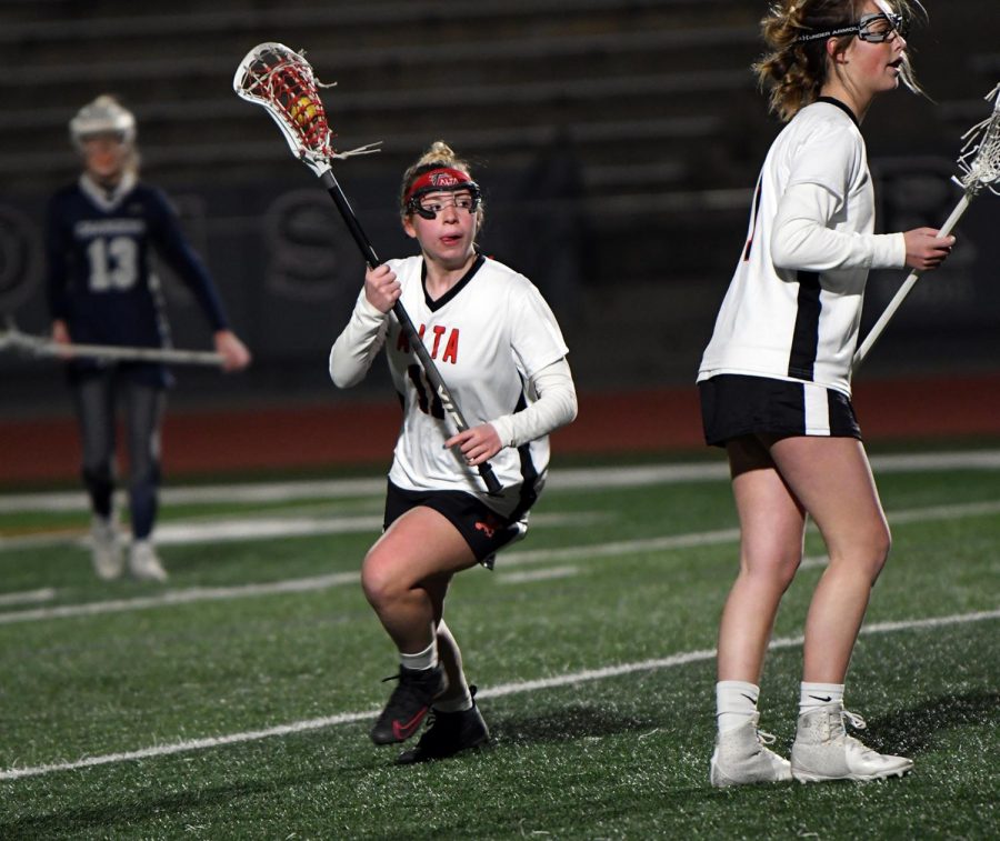 Kenra Ashby heads towards the goal. A formidable foe, the girls team is 10-2 in region play.