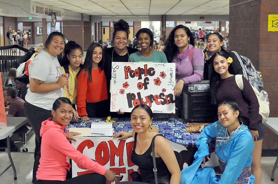 Members of the People of Polynesia club pose at the Club Rush held in the commons in the fall of 2019.