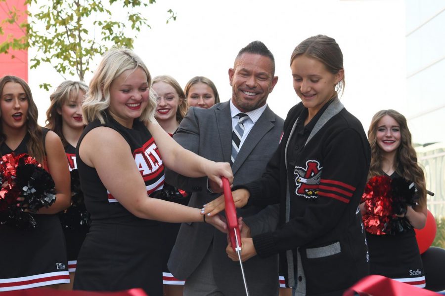 Head Cheerleader Annie Brimley and Student Body President Autumn Engstrom cut the ribbon as a symbolic gesture of the soon to be complete Alta High Remodel that began in 2017 with the passage of the $263 million dollar school bond.