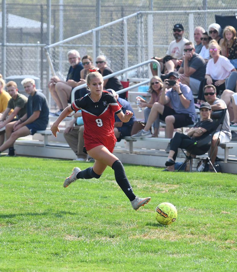 Sophomore Ella Labrum makes a break for the goal in the match against Jordan.