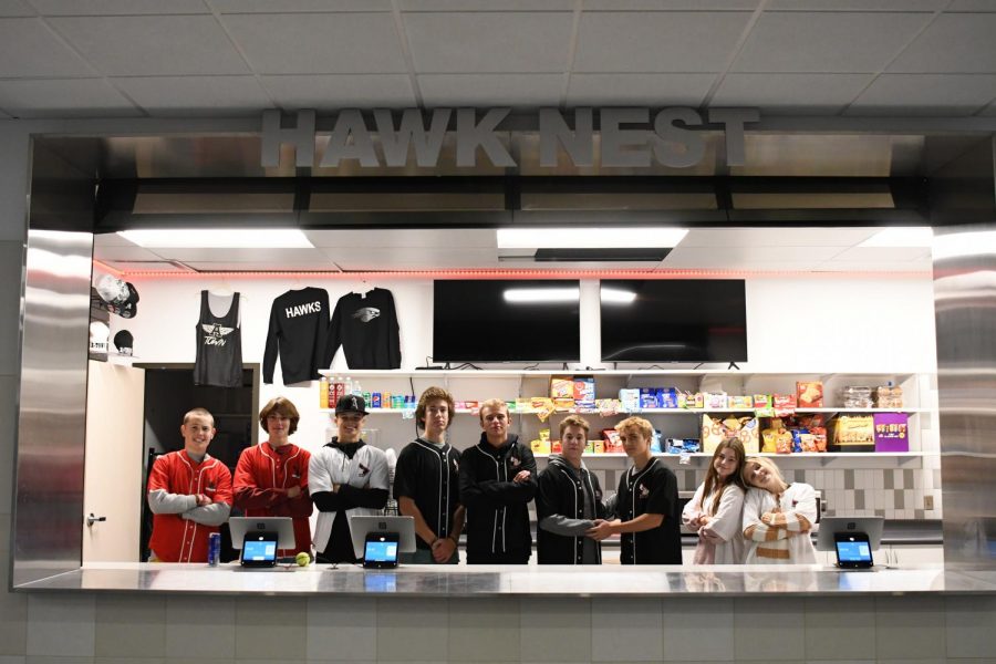 The B Day school store staff poses on the Hawk Nest's opening day. The Nest is now open for business.