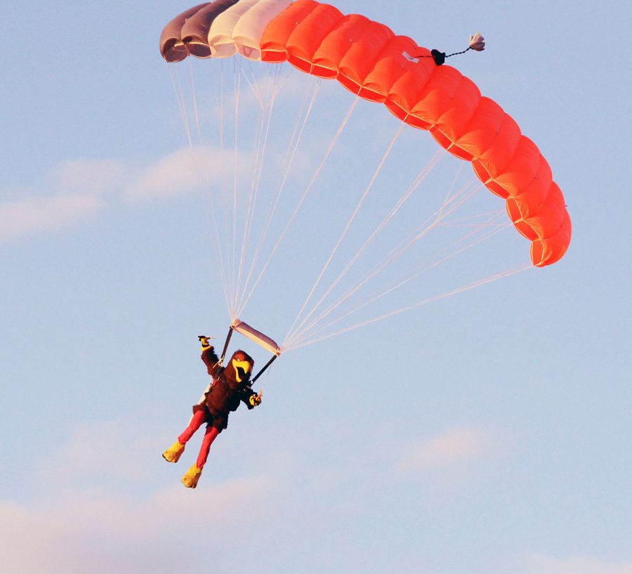 Herbie skydives into the Doug Anderson Field as part of the Homecoming Pep Rally in 2013.