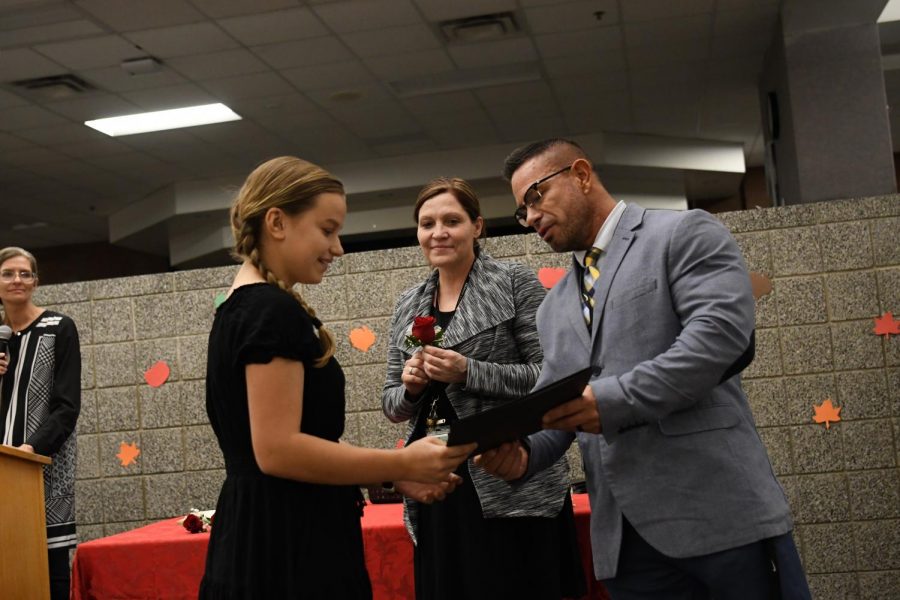 De. McGill and Sarah Conner present Kate Numbers her Sterling Scholar Award