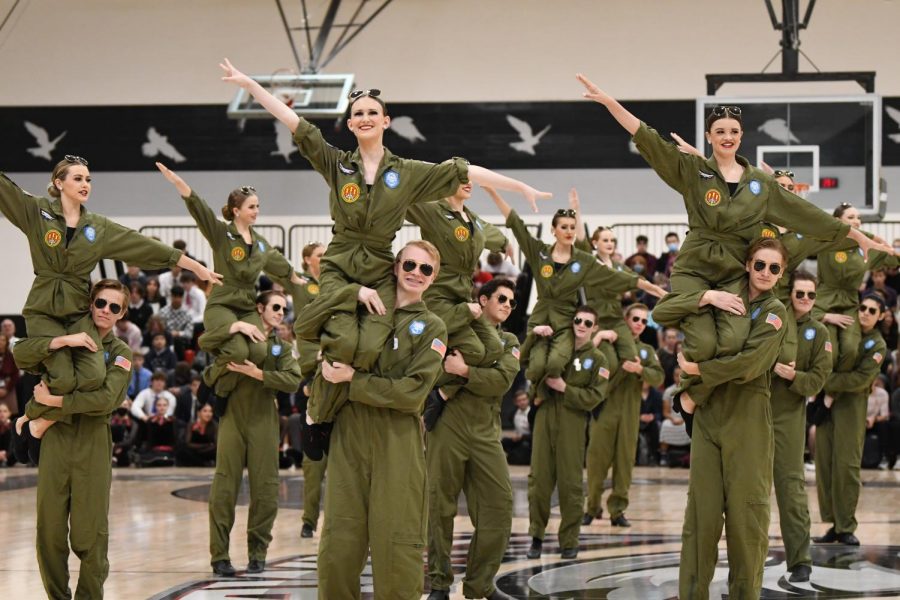 Dressed in army jumpsuits, Altas Ballroom Team performs for this years Veterans Assembly to the tune Danger Zone from the movie top Gun. 