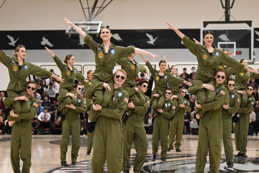 Dressed in army jumpsuits, Alta's Ballroom Team performs for this year's Veteran's Assembly to the tune "Danger Zone" from the movie top Gun. 