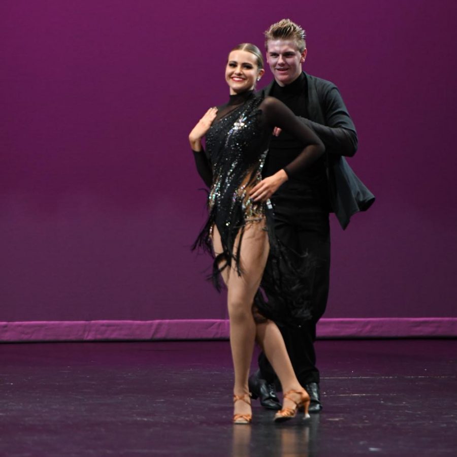 Ballroom team member Sophie Duncan performs with Jett Lundberg. After weeks and many hours of practice, the duo took first place in this years Dancing with the Hawks competition December 6th.