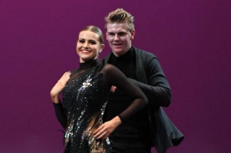 Ballroom team member Sophie Duncan performs with Jett Lundberg. After weeks and many hours of practice, the duo took first place in this years Dancing with the Hawks competition December 6th.