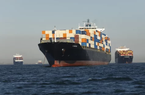 These container ships are waiting to be unloaded off the coast of Los Angeles. 