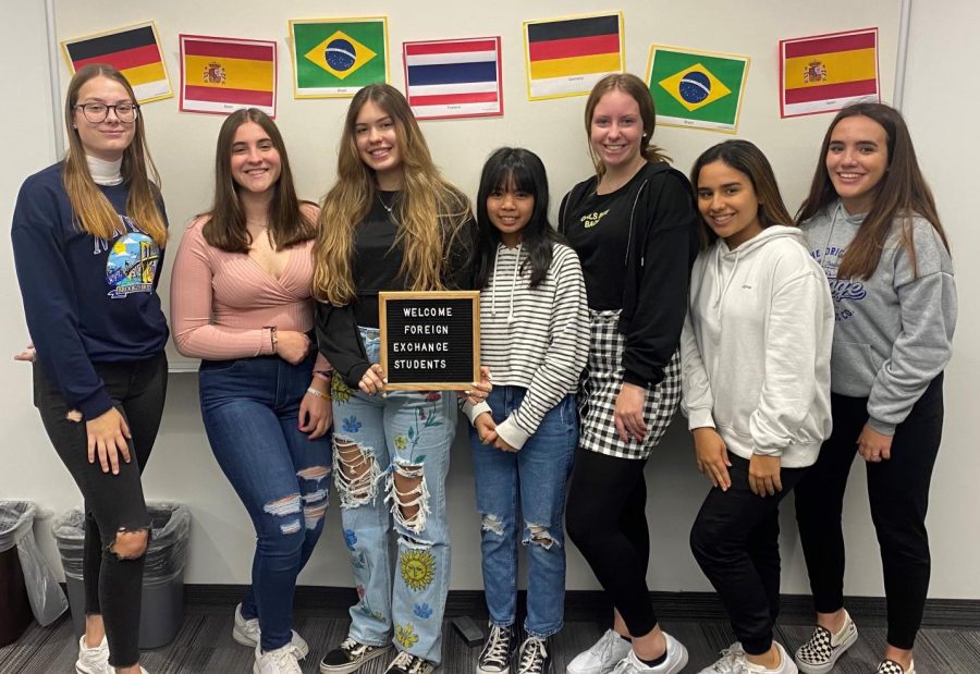 Foreign Exchange students at Alta pose with their respective flags.