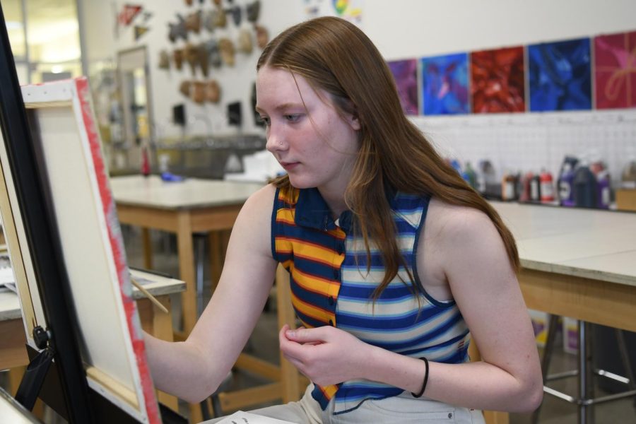 Calleigh Crowley channels her creative genius during class. Her art work, along with that of Catherine Debry and Madison Lowenberg, were accepted into this years High School Art Show at the Springville Museum of Art.