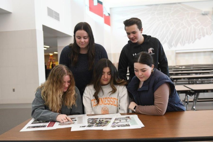 Yearbook students review proofs for the 2021-2022 Yearbook.