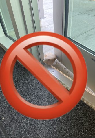 Students are admonished to not prop doors open during the day. Doors are locked outside of passing time to keep everyone in the building safer. If the doors are locked,people must enter from the main front doors.