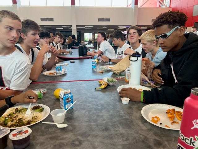 Students gather for lunch around the new cafeteria tables. This years students are cleaning up after themselves better than before.