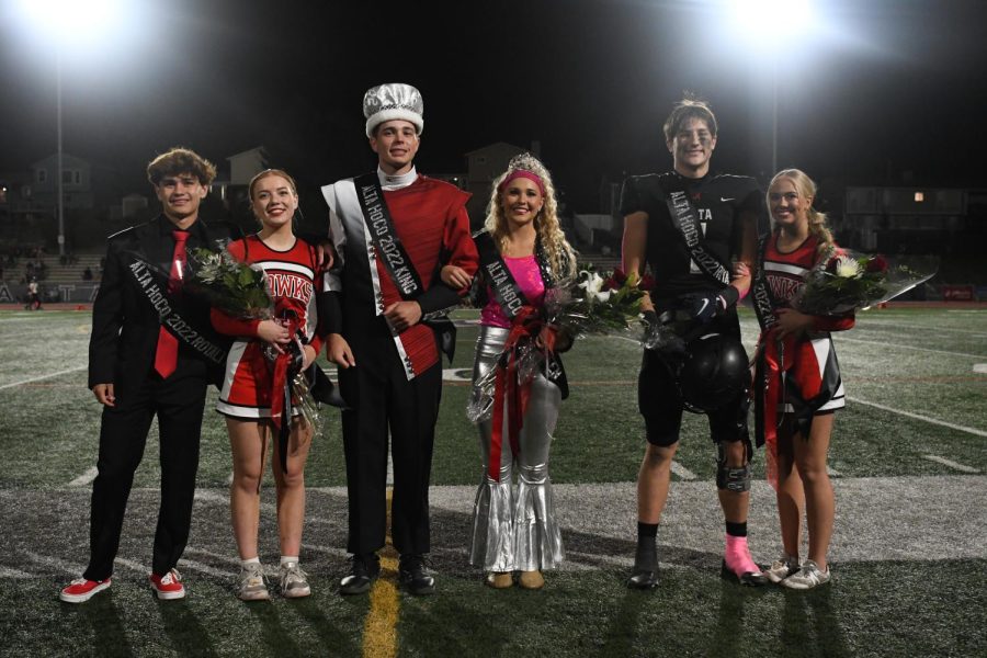 This year's Homecoming Royalty pose at the conclusion of the halftime extravaganza. They are (left to right): Alex Lopez and Audrey Kremser (first attendants), Sam Mazuran and Destiny Howard (King and Queen), and Boston Blanco and Kennedy Guth (second attendants).