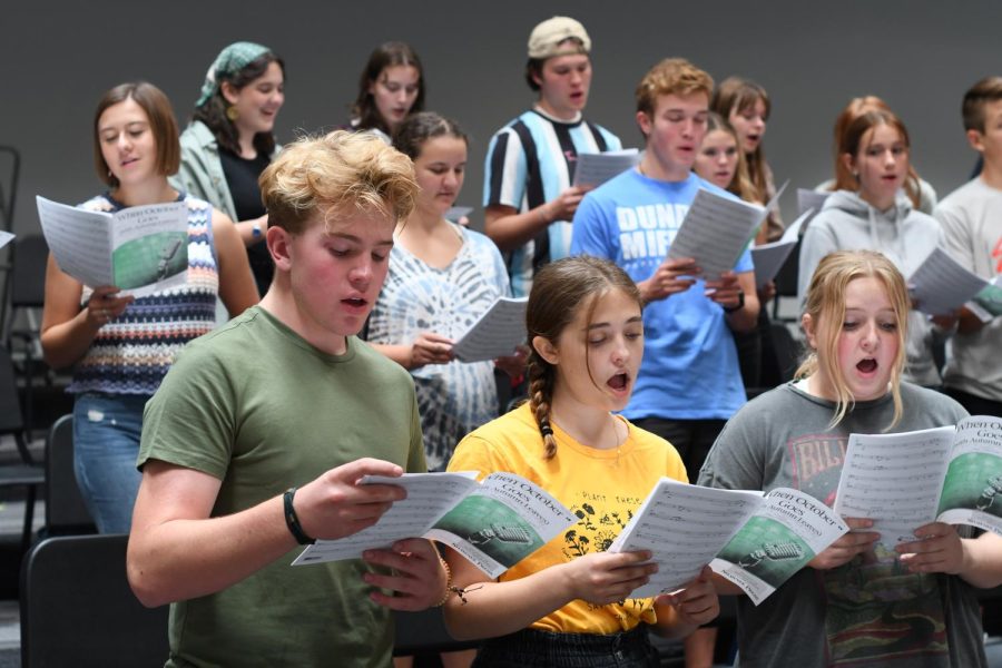 Choir students work on musical numbers for their fall concert.