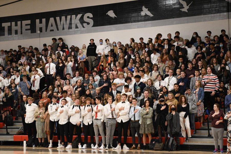 Dressed up, students stand for the flag ceremony at the 2021 Veterans Assembly.