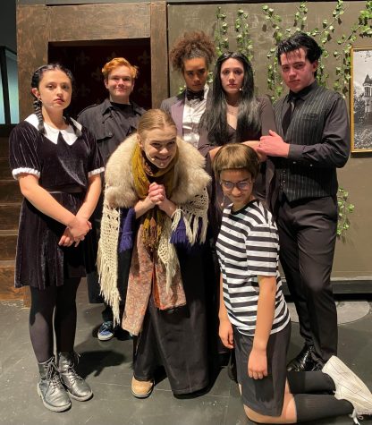 The Addams family poses for a family photo prior to this weeks performance on the Alta Stage.