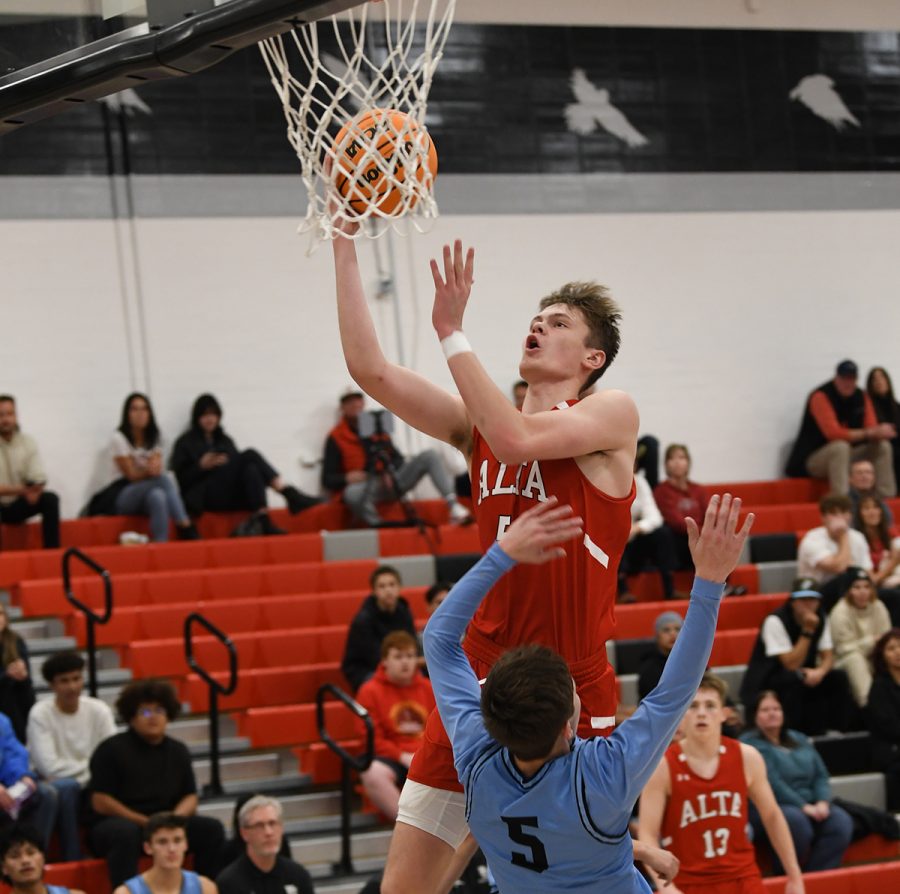 With eyes on the basket, Jack Johnson goes in for a score.