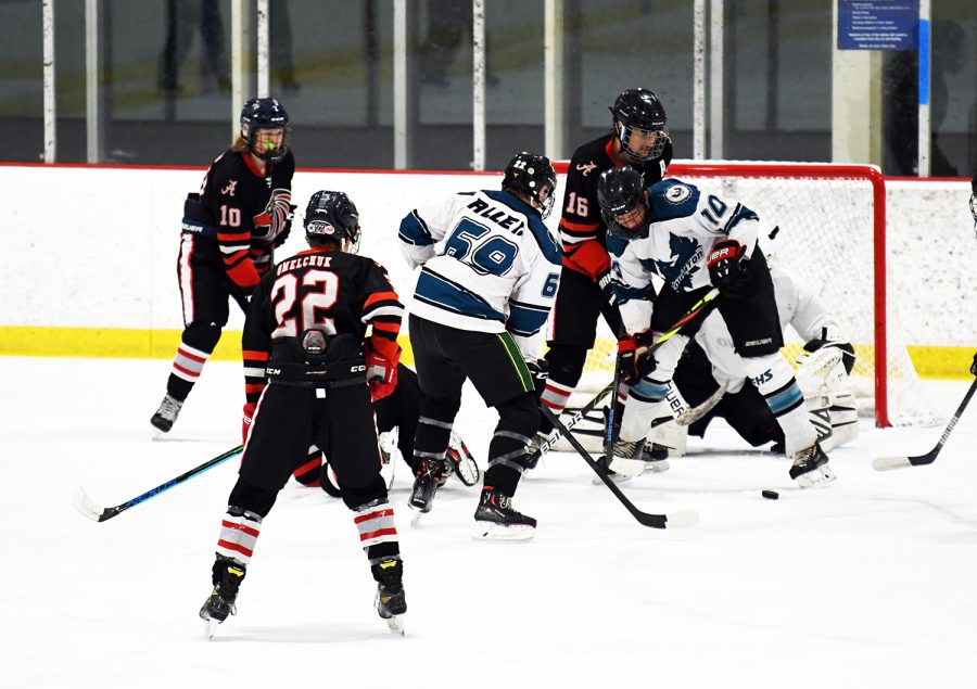 Vincent Turcotte defends the goal at the Cottonwood Heights Ice Arena as Alta takes on Copper Hills early in the season.