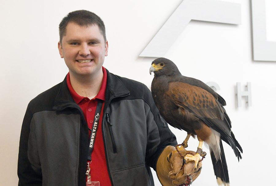 New Assistant Principal Kory Crockett poses with Hawk Stella who made an appearance at this year's Legacy Assembly.