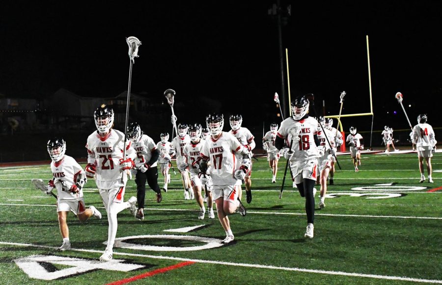 Alta Boys Lacrosse take the field in their game against Mountain View.