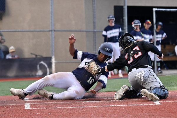 Nolan Lohnes tags a runner out in a game last year.
